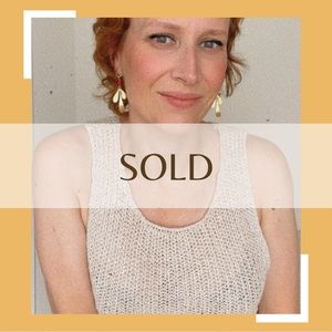 Summer knitted tank top in cream.